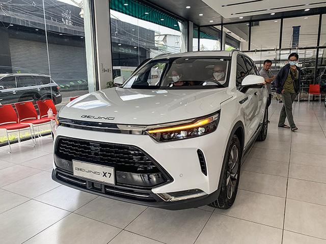 Ôtô Trung Quốc giảm thêm gần cả trăm triệu đồng/xe - Ảnh 1. Ôtô Trung Quốc giảm thêm gần cả trăm triệu đồng/xe - Ảnh 1.