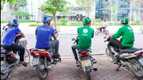 Lộ sai phạm khi Grab thâu tóm Uber tại Việt Nam