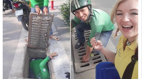 Grabber không ngần ngại giúp cô gái nước ngoài nhặt lại chiếc ví rơi dưới cống: Thêm lý do để yêu con người Việt Nam