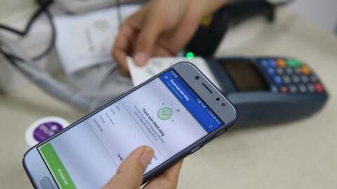 Tết năm nay, nhiều ngân hàng sẽ hết cảnh nghẽn giao dịch?