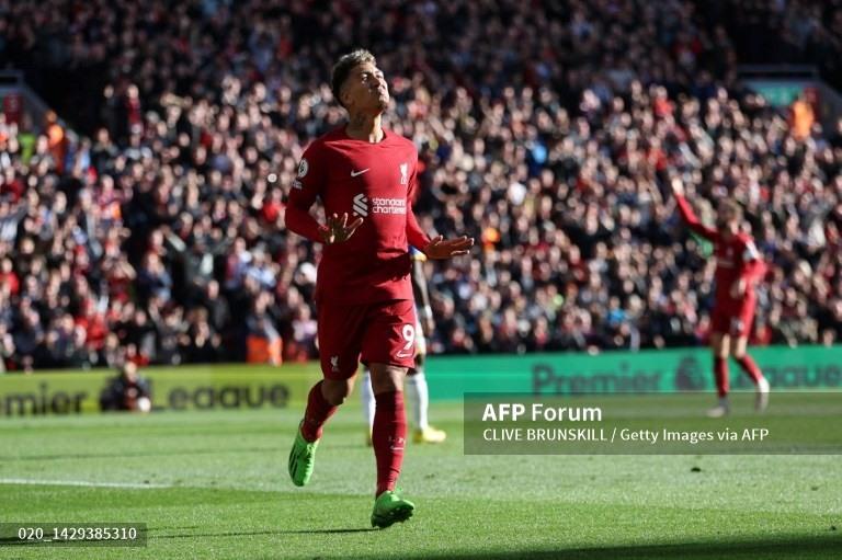 Firmino thắp lại hy vọng có điểm cho Liverpool.  Ảnh: AFP