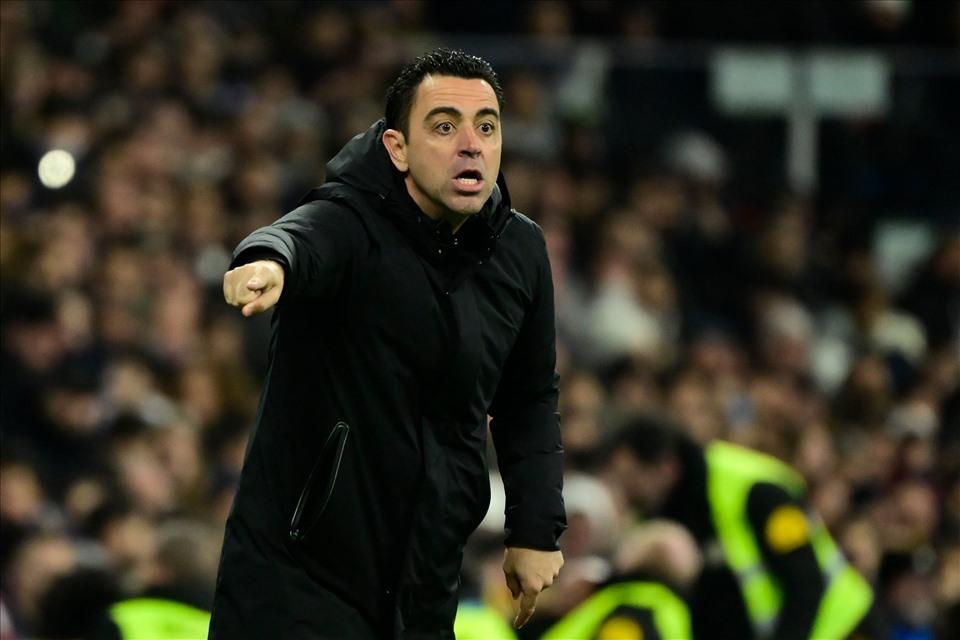 Xavi hiểu thành tích mùa vừa rồi của Barcelona không thể là đai an toàn đảm bảo cho một mùa giải mới thành công. Ảnh: AFP