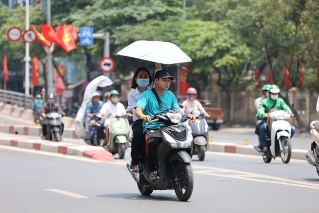 Miền Bắc đón nắng nóng gay gắt trở lại - Ảnh 1.