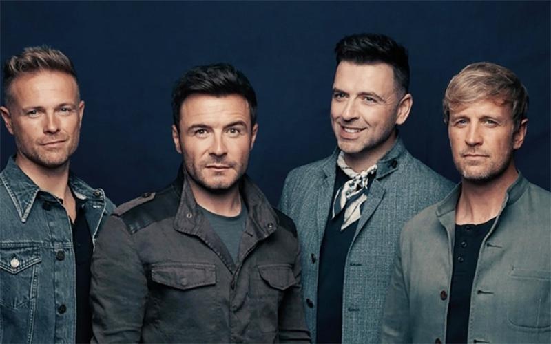 Westlife được săn đón khi đến Hà Nội năm 2011. Ảnh: Nhà sản xuất cung cấp