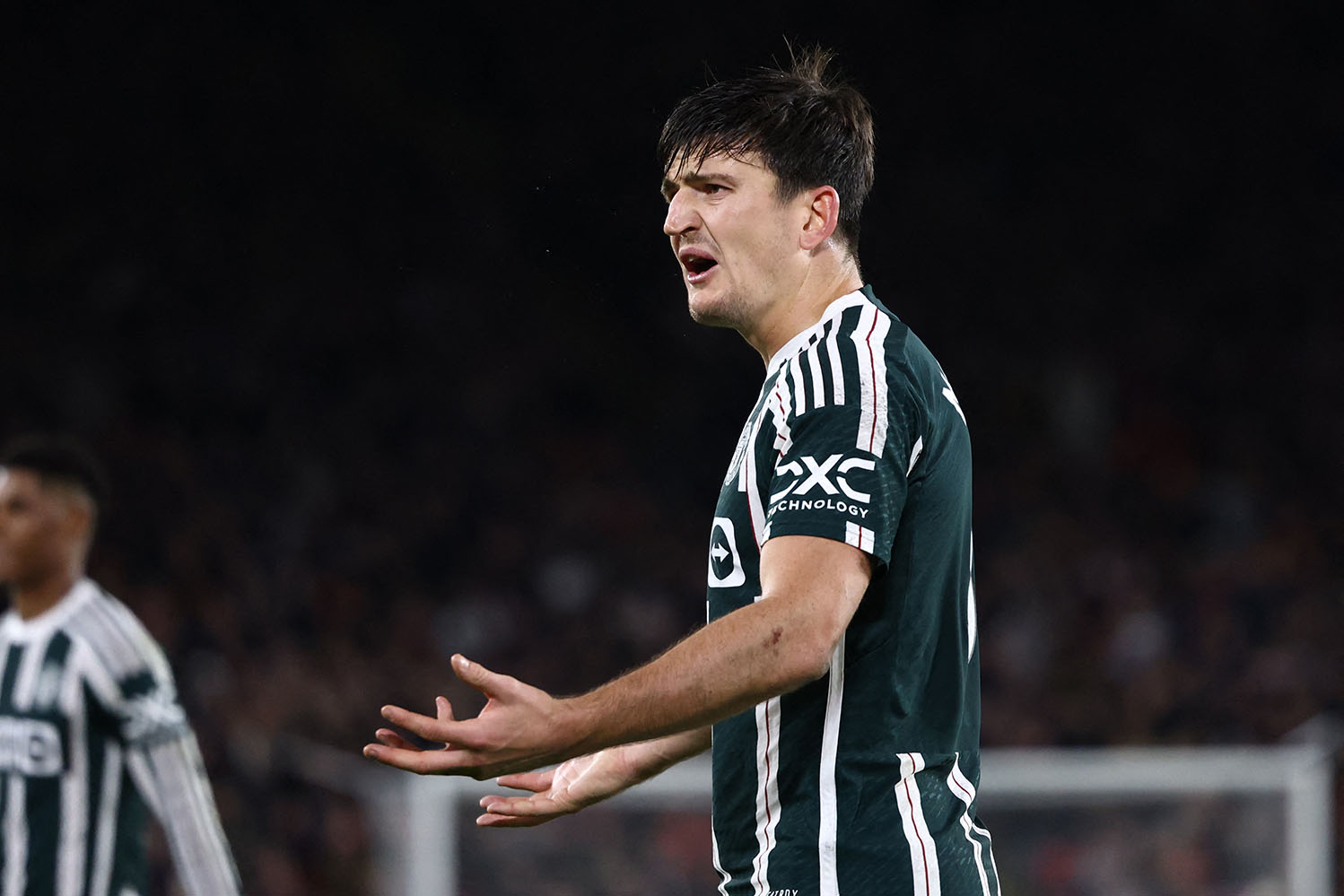 Harry Maguire đang có phong độ cao và nhiều khả năng được Ten Hag tin tưởng xếp đá chính.   Ảnh: AFP