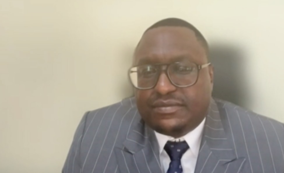 Phó giáo sư Kudzai Dominic Chiwenga. Ảnh cắt từ video của RT